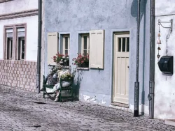 Bild: Lebensart am Kiethof in Aschersleben. Die Straße im sogenannten Künstlerviertel strahlt zweifellos die Gemütlichkeit einer Kleinstadt vergangener Zeiten aus. Klicken Sie auf das Bild um es zu vergrößern.